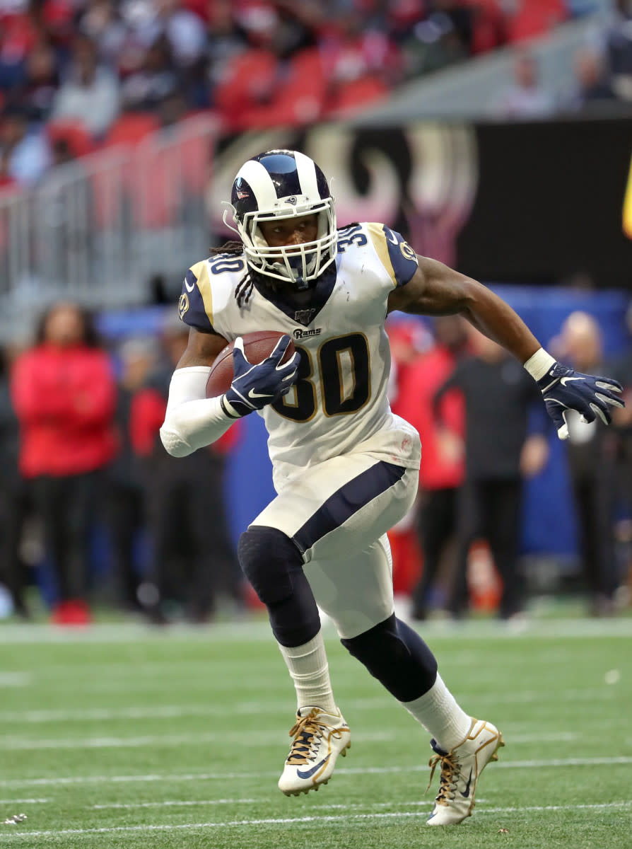 Rams running back Todd Gurley runs the ball in the fourth quarter against the Falcons at Mercedes-Benz Stadium in 2019.
